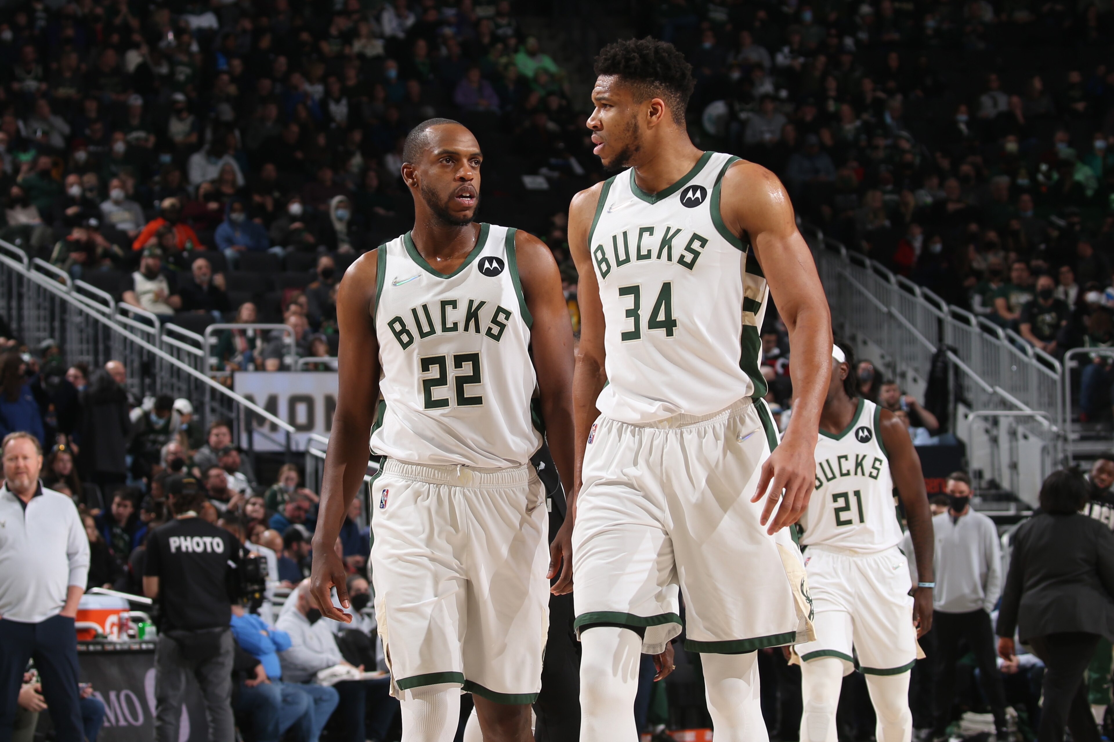 MILWAUKEE, WI - FEBRUARY 15: Khris Middleton #22 talks to Giannis Antetokounmpo #34 of the Milwaukee Bucks during the game against the Indiana Pacers on February 15, 2022 at the Fiserv Forum Center in Milwaukee, Wisconsin. NOTE TO USER: User expressly acknowledges and agrees that, by downloading and or using this Photograph, user is consenting to the terms and conditions of the Getty Images License Agreement. Mandatory Copyright Notice: Copyright 2022 NBAE (Photo by Gary Dineen/NBAE via Getty Images).