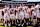 PASADENA, CALIFORNIA - JANUARY 01: The Alabama Crimson Tide huddle along the sideline during the CFP Semifinal Rose Bowl Game against the Michigan Wolverines at Rose Bowl Stadium on January 1, 2024 in Pasadena, California. (Photo by Ryan Kang/Getty Images)