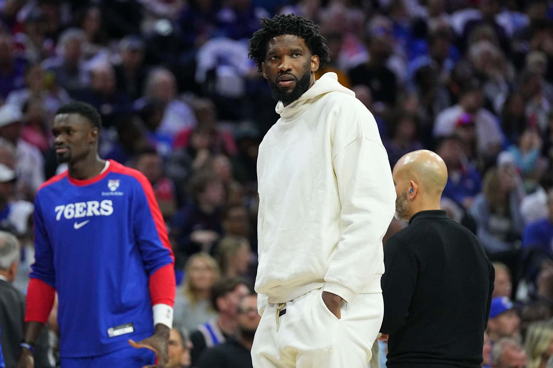 PHILADELPHIA, PENNSYLVANIA - OCTOBER 23: Joel Embiid #21 of the Philadelphia 76ers looks on during a timeout against the Milwaukee Bucks in the first half at the Wells Fargo Center on October 23, 2024 in Philadelphia, Pennsylvania. NOTE TO USER: User expressly acknowledges and agrees that, by downloading and/or using this photograph, user is consenting to the terms and conditions of the Getty Images License Agreement. (Photo by Mitchell Leff/Getty Images)