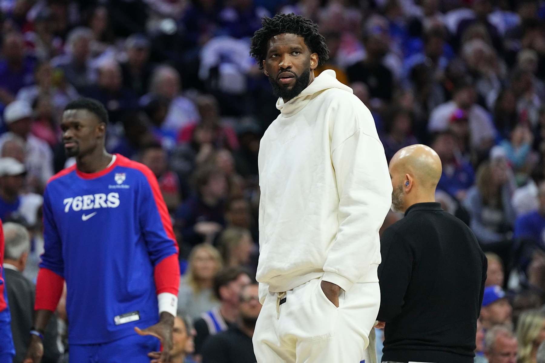 PHILADELPHIA, PENNSYLVANIA - OCTOBER 23: Joel Embiid #21 of the Philadelphia 76ers looks on during a timeout against the Milwaukee Bucks in the first half at the Wells Fargo Center on October 23, 2024 in Philadelphia, Pennsylvania. NOTE TO USER: User expressly acknowledges and agrees that, by downloading and/or using this photograph, user is consenting to the terms and conditions of the Getty Images License Agreement. (Photo by Mitchell Leff/Getty Images)