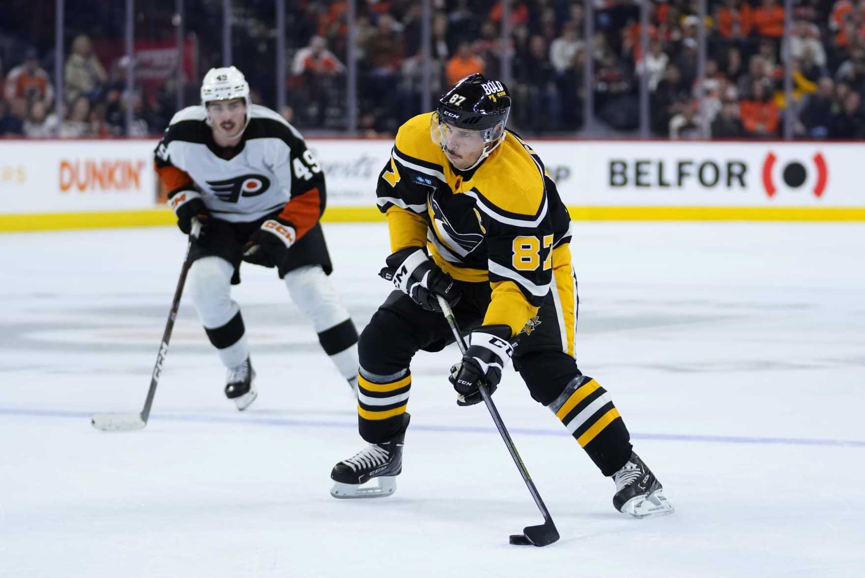 Pittsburgh Penguins' Sidney Crosby skates with the puck during the first period of an NHL hockey game against the Philadelphia Flyers, Friday, Nov. 25, 2022, in Philadelphia. (AP Photo/Matt Slocum)