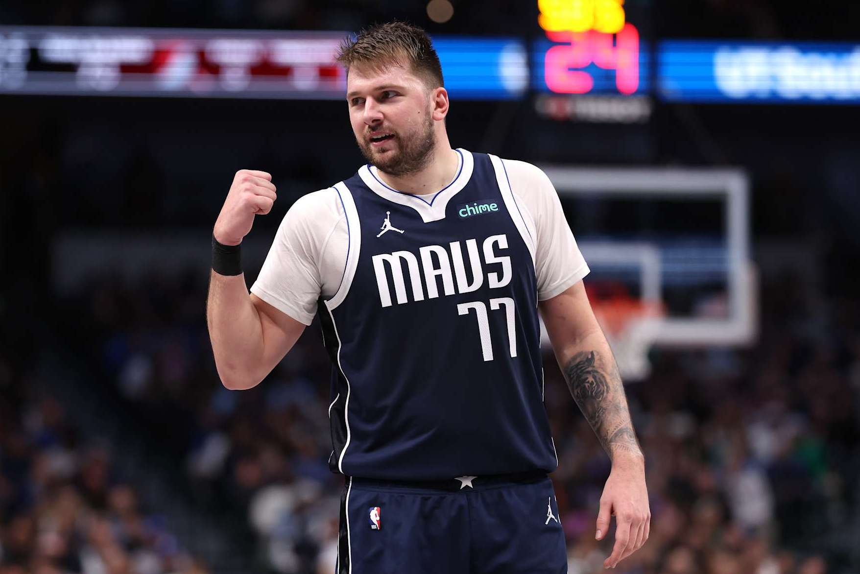 DALLAS, TEXAS - DECEMBER 23: Luka Doncic #77 of the Dallas Mavericks reacts during the second half against the Portland Trail Blazers at American Airlines Center on December 23, 2024 in Dallas, Texas. NOTE TO USER: User expressly acknowledges and agrees that, by downloading and/or using this photograph, user is consenting to the terms and conditions of the Getty Images License Agreement. (Photo by Sam Hodde/Getty Images)