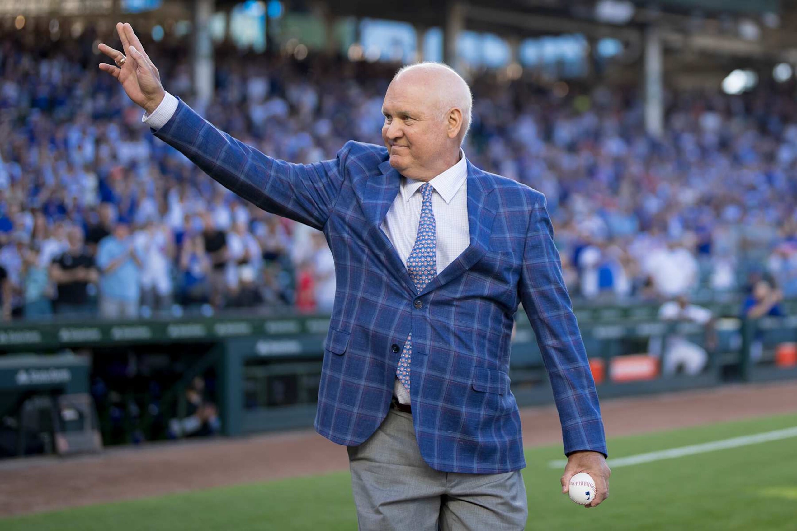 CHICAGO, IL - June 23: Ryne Sandberg of the Chicago Cubs acknowledges the crowd following a statue dedication ceremony held at Wrigley Field on June 23, 2024 in Chicago, Illinois. (Photo by Matt Dirksen/Chicago Cubs/Getty Images)