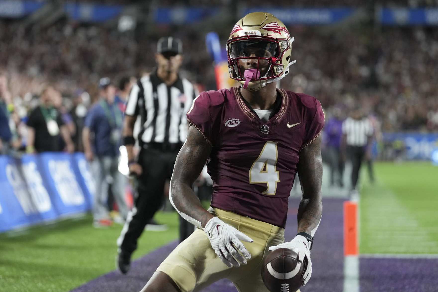 ORLANDO, FL - SEPTEMBER 03: Florida State Seminoles wide receiver Keon Coleman (4) takes a moment to enjoy his touchdown during the Camping World Kickoff game between the LSU Tigers and the Florida State Seminoles, on Sunday, September 3, 2023 at Camping World Stadium in Orlando, Fla. (Photo by Peter Joneleit/Icon Sportswire via Getty Images)