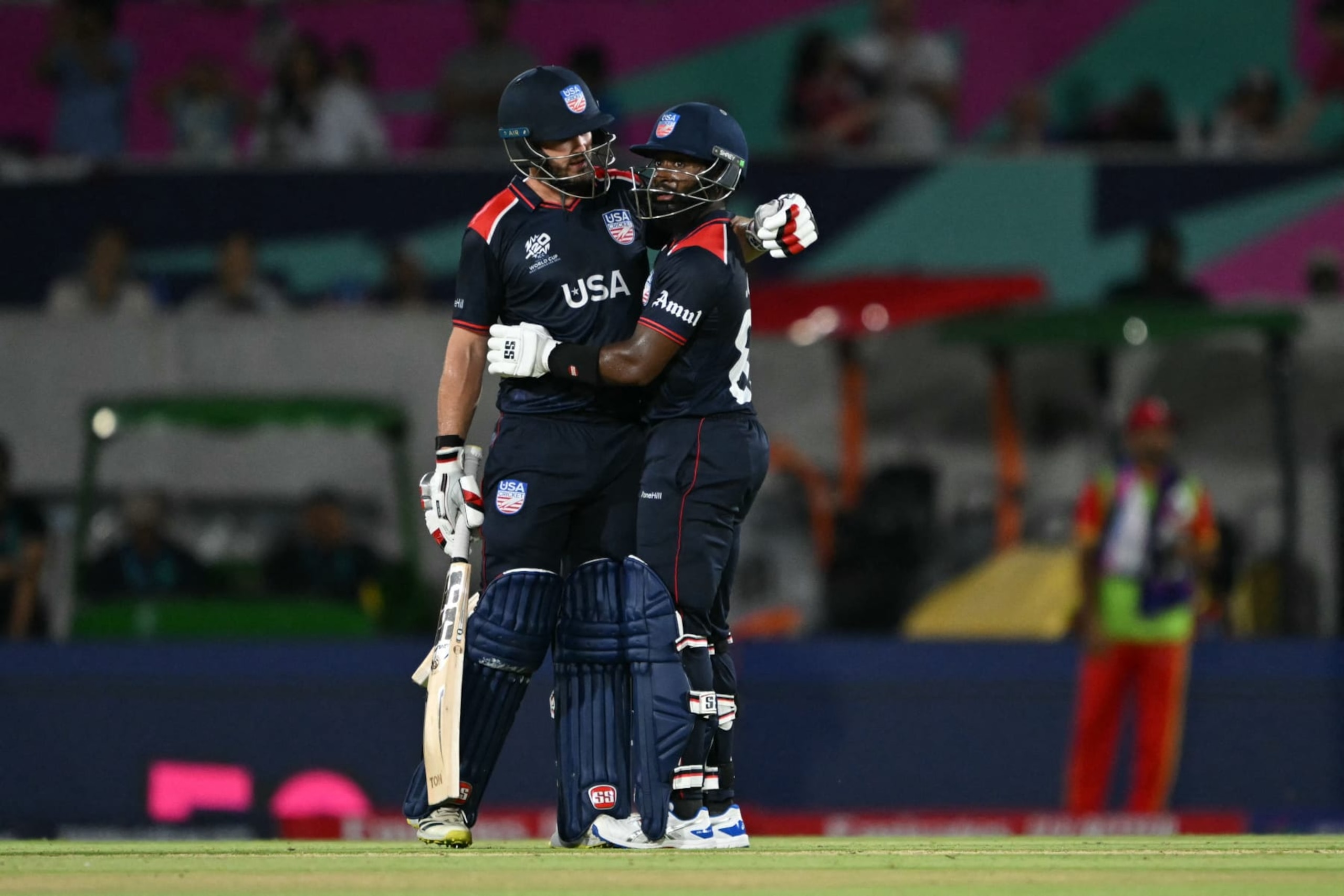USA's vice-captain Aaron Jones (R) celebrates a half century (50 runs)  during the ICC men's Twenty20 World Cup 2024 group A cricket match between the USA and Canada at the Grand Prairie Cricket Stadium in Grand Prairie, Texas on June 1, 2024. (Photo by Andrew Caballero-Reynolds / AFP) (Photo by ANDREW CABALLERO-REYNOLDS/AFP via Getty Images)