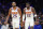 PHILADELPHIA, PA - NOVEMBER 07: Mikal Bridges #25 and Deandre Ayton #22 of the Phoenix Suns in action against the Philadelphia 76ers at the Wells Fargo Center on November 7, 2022 in Philadelphia, Pennsylvania. The 76ers defeated the Suns 100-88. NOTE TO USER: User expressly acknowledges and agrees that, by downloading and or using this photograph, User is consenting to the terms and conditions of the Getty Images License Agreement. (Photo by Mitchell Leff/Getty Images)