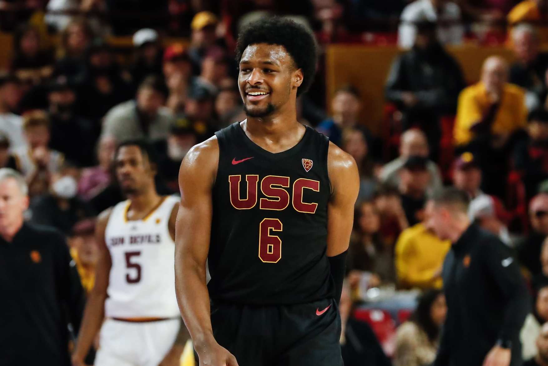 TEMPE, AZ - JANUARY 20: USC Trojans guard Bronny James (6) smiles during the college basketball game between the USC Trojans and the Arizona State Sun Devils on January 20, 2024 at Desert Financial Arena in Tempe, Arizona. (Photo by Kevin Abele/Icon Sportswire via Getty Images)