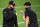 LAS VEGAS, NEVADA - SEPTEMBER 21:  Head coach Jon Gruden (L) and general manager Mike Mayock of the Las Vegas Raiders celebrate on the field after the Raiders defeated the New Orleans Saints 34-24 in the NFL game at Allegiant Stadium on September 21, 2020 in Las Vegas, Nevada.  (Photo by Ethan Miller/Getty Images)