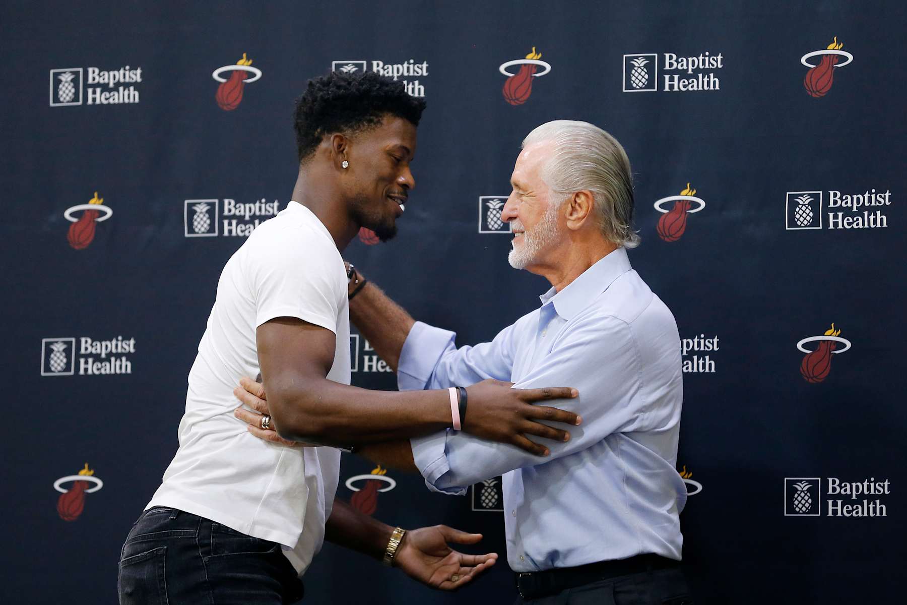 MIAMI, FLORIDA - SEPTEMBER 27: Jimmy Butler #22 of the Miami Heat hugs president Pat Riley after his introductory press conference at American Airlines Arena on September 27, 2019 in Miami, Florida. NOTE TO USER: User expressly acknowledges and agrees that, by downloading and or using this photograph, User is consenting to the terms and conditions of the Getty Images License Agreement. (Photo by Michael Reaves/Getty Images)