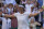 Tunisia's Ons Jabeur reacts after beating Marie Bouzkova of the Czech Republic in a women's singles quarterfinal match on day nine of the Wimbledon tennis championships in London, Tuesday, July 5, 2022. (AP Photo/Alastair Grant)