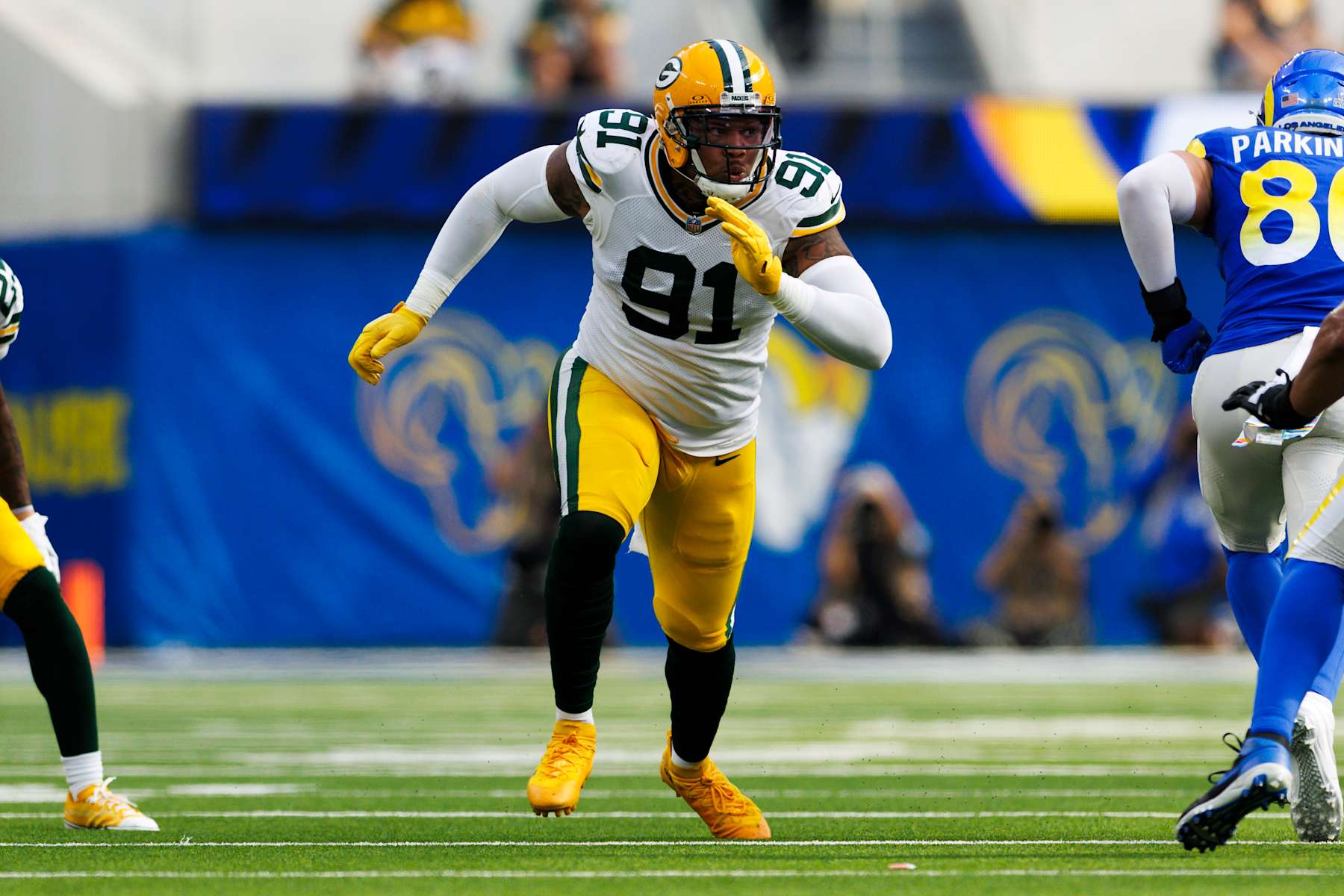 INGLEWOOD, CALIFORNIA - OCTOBER 6: Preston Smith #91 of the Green Bay Packers rushes the edge during the second half against the Los Angeles Rams at SoFi Stadium on October 6, 2024 in Inglewood, California. (Photo by Ric Tapia/Getty Images)