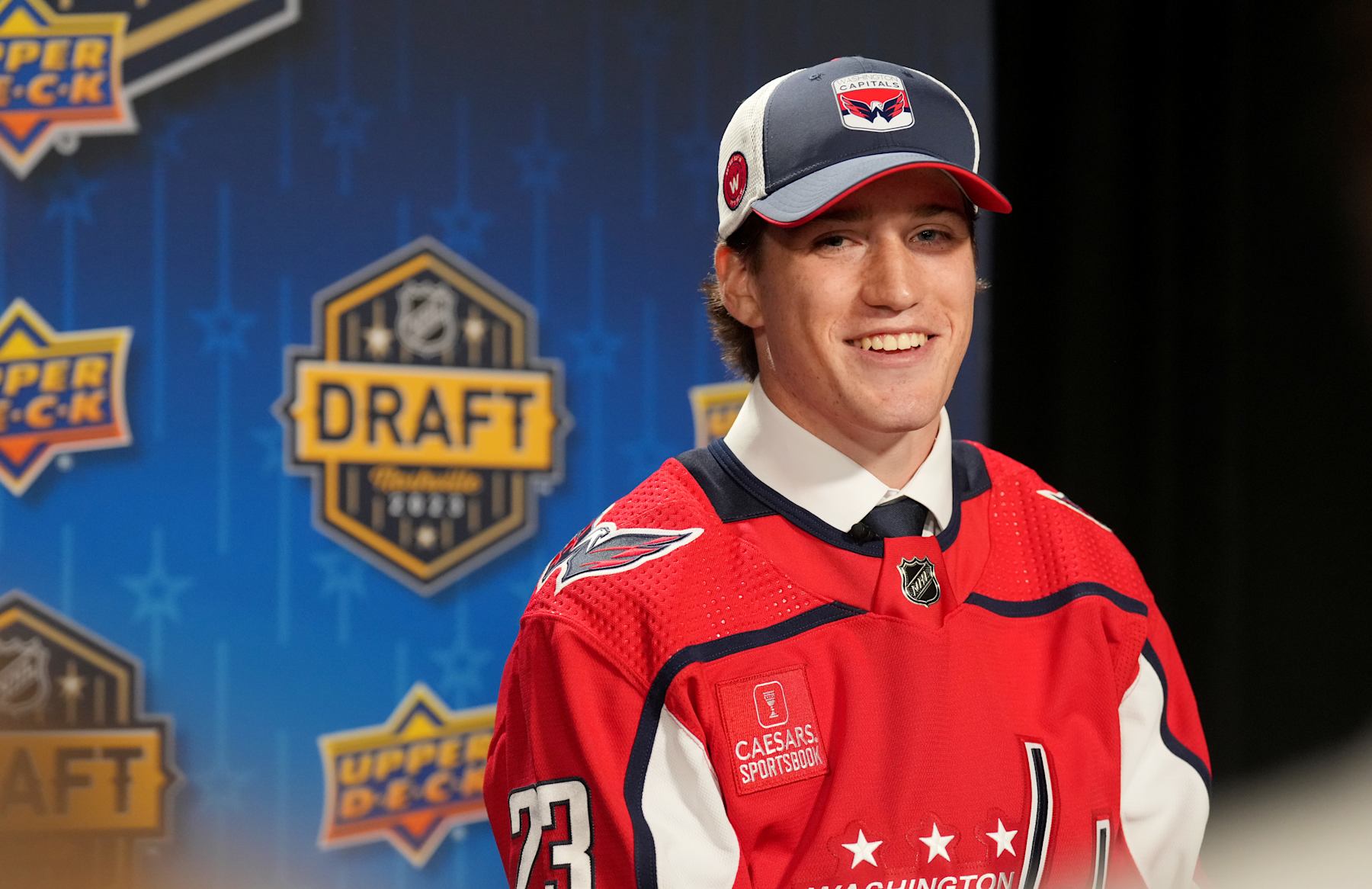 NASHVILLE, TENNESSEE - JUNE 28: Ryan Leonard looks on during an interview after being selected eighth overall by the Washington Capitals during the 2023 Upper Deck NHL Draft - Round One at Bridgestone Arena on June 28, 2023 in Nashville, Tennessee. (Photo by John Russell/NHLI via Getty Images)