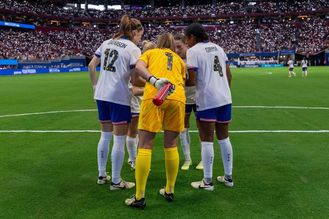 ATLANTA, GA - APRIL 6: Tierna Davidson #12, Alyssa Naeher #1, Naomi Girma #4 and Emily Fox #23 of the United States huddle on the field before a SheBelieves Cup game between Japan and the USWNT at Mercedes-Benz Stadium on April 6, 2024 in Atlanta, Georgia. (Photo by Brad Smith/ISI Photos/USSF/Getty Images for USSF)