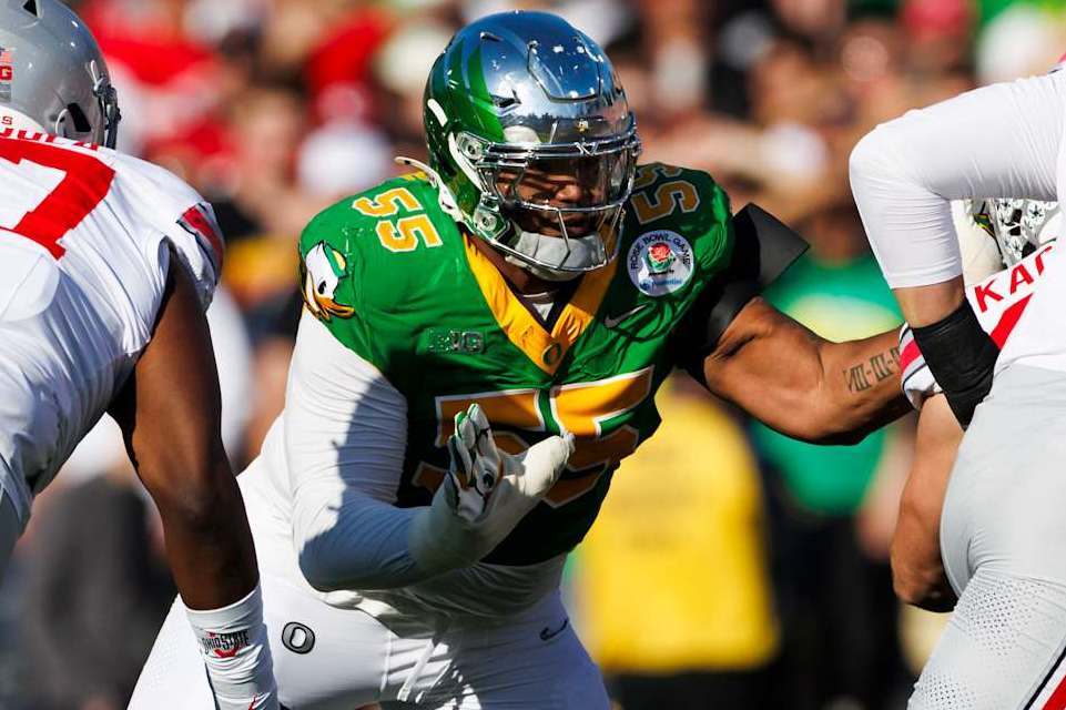 PASADENA, CALIFORNIA - JANUARY 1: Derrick Harmon #55 of the Oregon Ducks rushes the edge in the first half during the Rose Bowl against Ohio State Buckeyes at Rose Bowl Stadium on January 1, 2025 in Pasadena, California. (Photo by Ric Tapia/Getty Images)