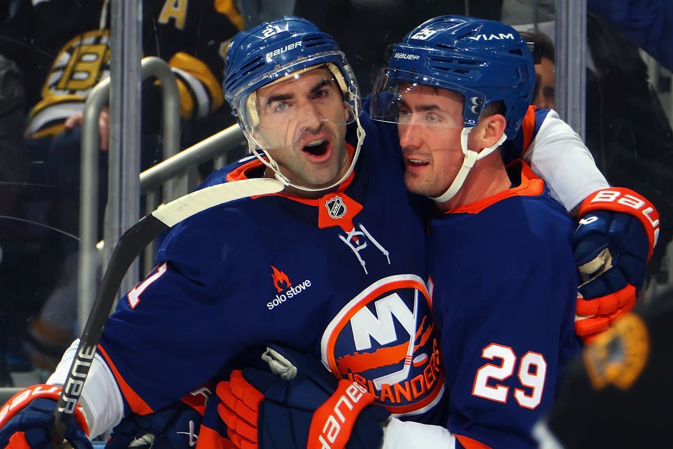 ELMONT, NEW YORK - NOVEMBER 27: Brock Nelson #29 of the New York Islanders (r) celebrates his second period goal against the Boston Bruins along with Kyle Palmieri #21 (l) at UBS Arena on November 27, 2024 in Elmont, New York. (Photo by Bruce Bennett/Getty Images)
