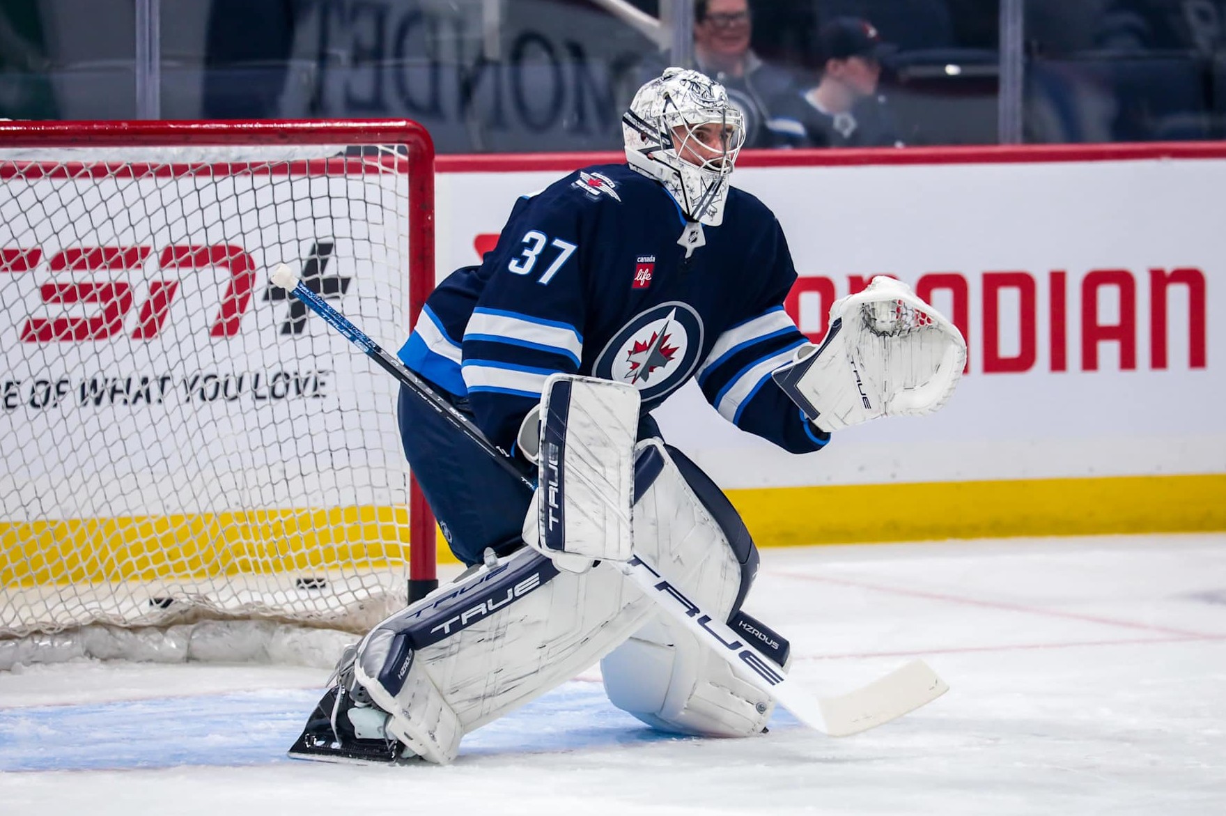 WINNIPEG, CANADA - OCTOBER 13: Goaltender Connor Hellebuyck #37 of the Winnipeg Jets takes part in the pre-game warm up prior to NHL action against the Minnesota Wild at the Canada Life Centre on October 13, 2024 in Winnipeg, Manitoba, Canada. (Photo by Darcy Finley/NHLI via Getty Images) WINNIPEG, CANADA - OCTOBER 13: Goaltender Connor Hellebuyck #37 of the Winnipeg Jets takes part in the pre-game warm up prior to NHL action against the Minnesota Wild at the Canada Life Centre on October 13, 2024 in Winnipeg, Manitoba, Canada. (Photo by Darcy Finley/NHLI via Getty Images)