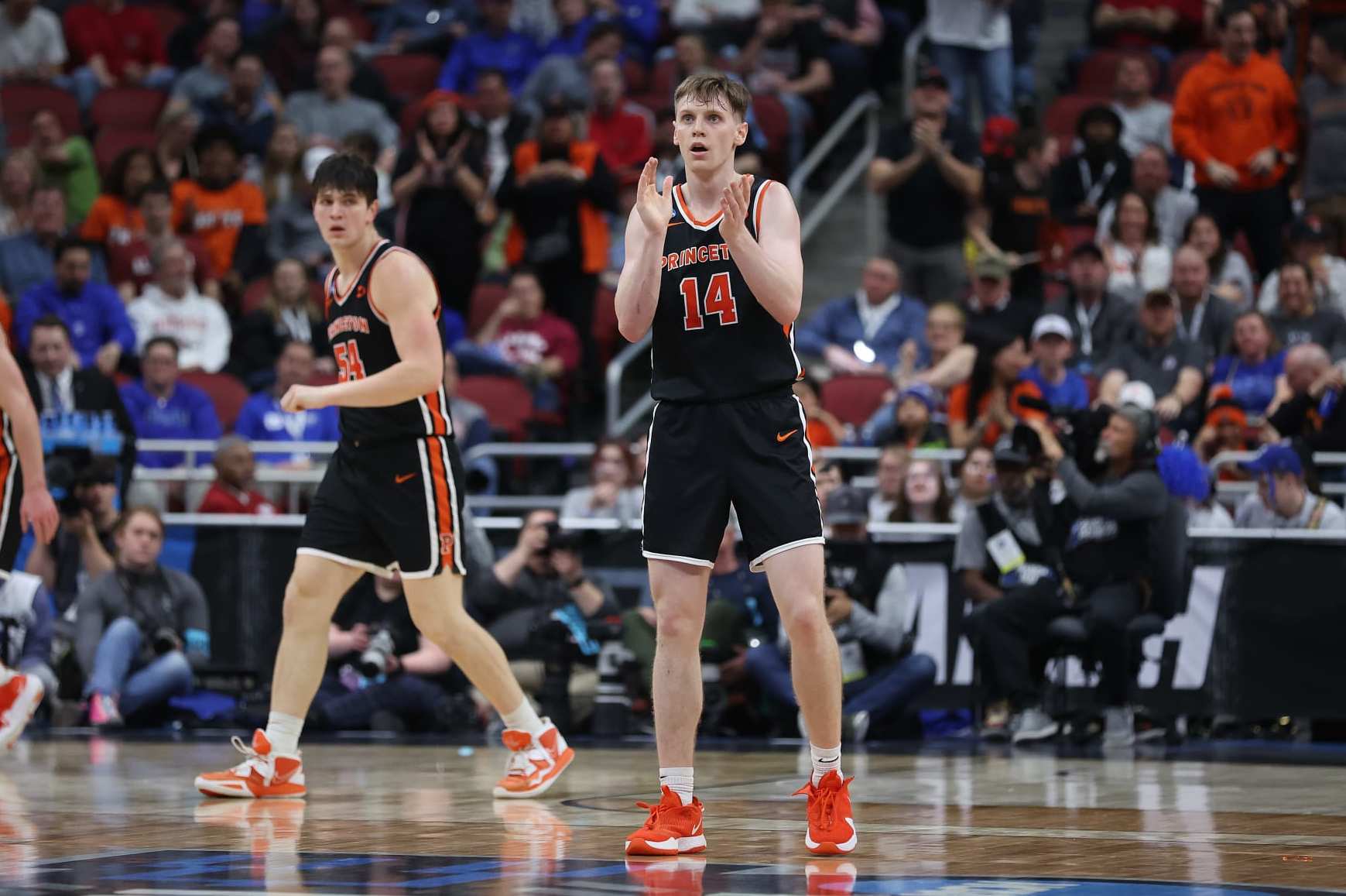 LOUISVILLE, KENTUCKY - MARCH 24: Matt Allocco #14 of the Princeton Tigers reacts during the first half in the Sweet 16 round of the NCAA Men's Basketball Tournament at KFC YUM! Center against the Creighton Bluejays on March 24, 2023 in Louisville, Kentucky. (Photo by Rob Carr/Getty Images)