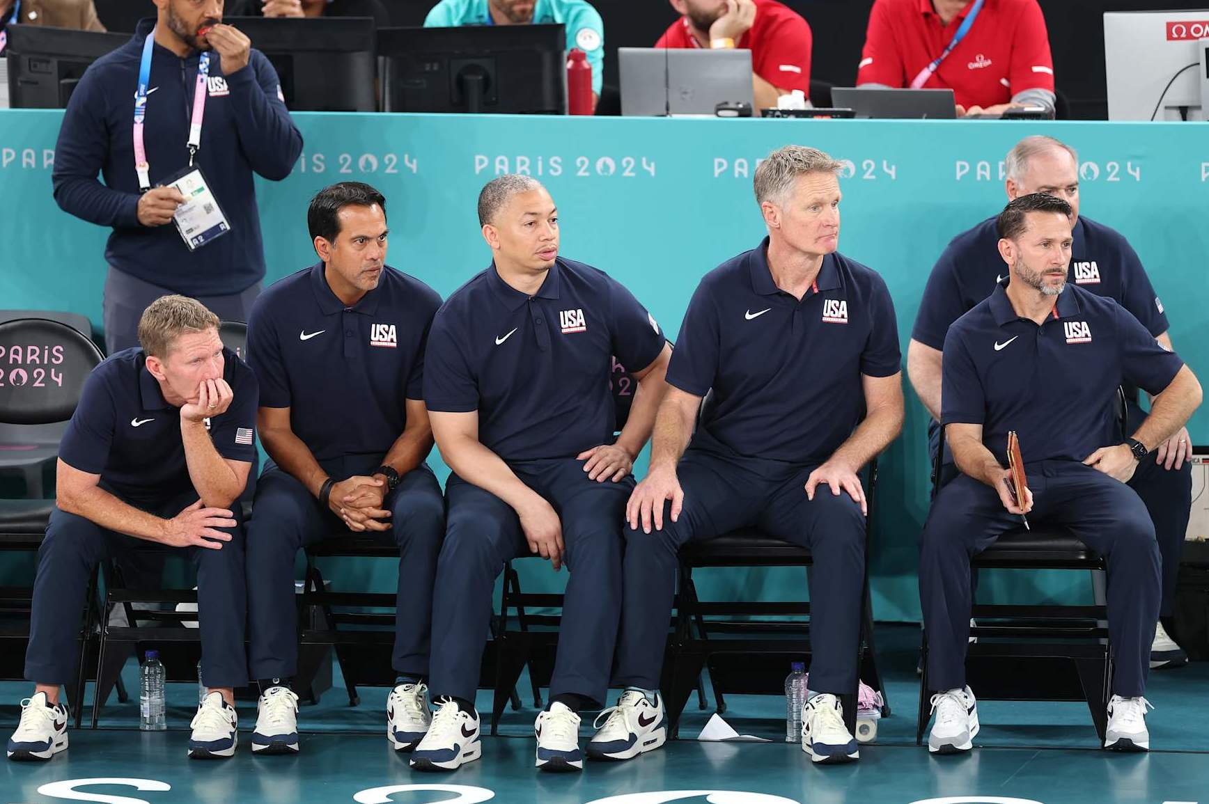 PARIS, FRANCE - AUGUST 10: (from left) Assistant coaches Mark Few, Erik Spoelstra, and Tyronn Lue of Team United States look on with head coach Steve Kerr of Team United States during the Men's Gold Medal game between Team France and Team United States on day fifteen of the Olympic Games Paris 2024 at Bercy Arena on August 10, 2024 in Paris, France. (Photo by Jamie Squire/Getty Images)