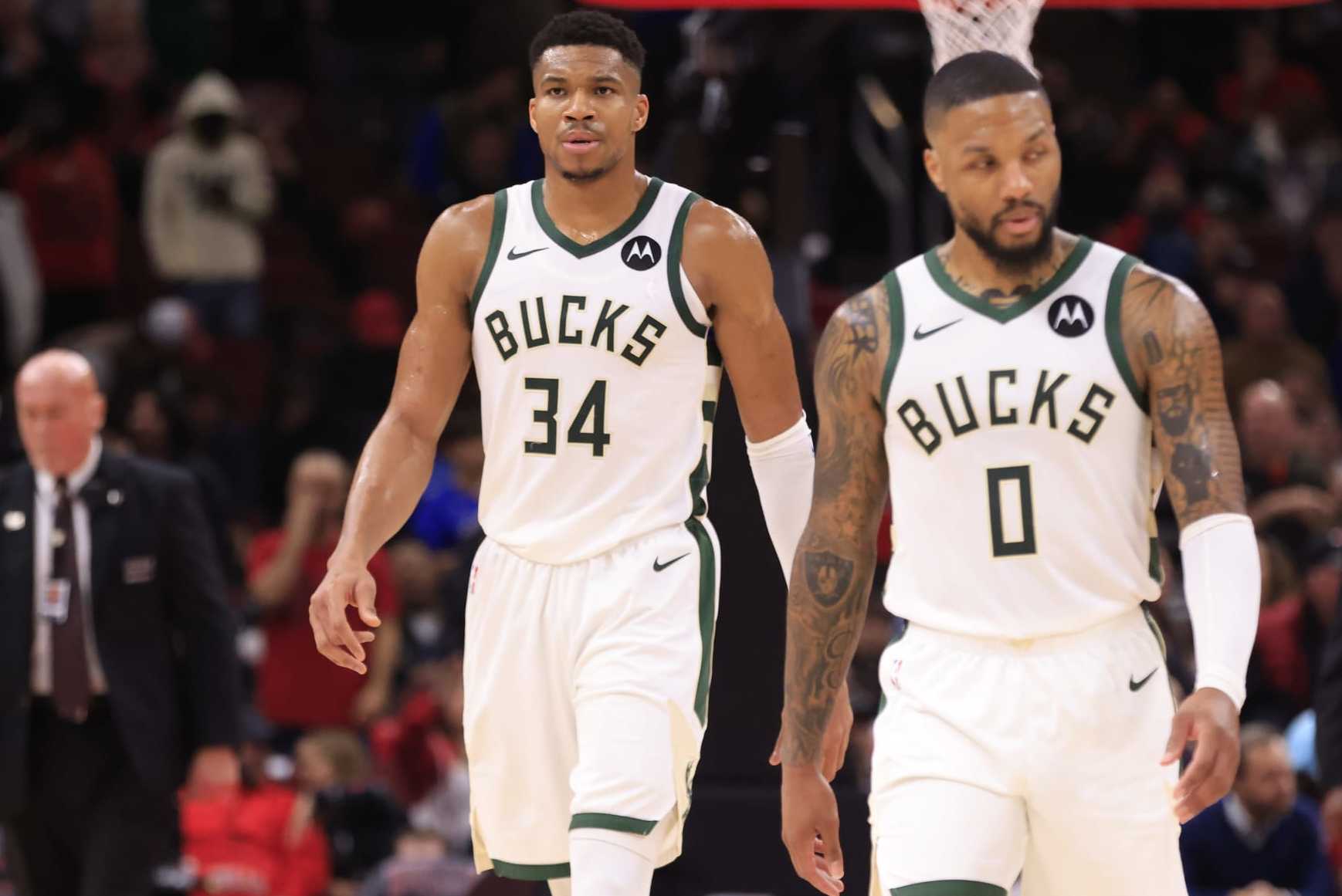 CHICAGO, ILLINOIS - NOVEMBER 30: Giannis Antetokounmpo #34 and Damian Lillard #0 of the Milwaukee Bucks walks the court in the game against the Chicago Bulls at the United Center on November 30, 2023 in Chicago, Illinois. NOTE TO USER: User expressly acknowledges and agrees that, by downloading and or using this photograph, User is consenting to the terms and conditions of the Getty Images License Agreement. (Photo by Justin Casterline/Getty Images)