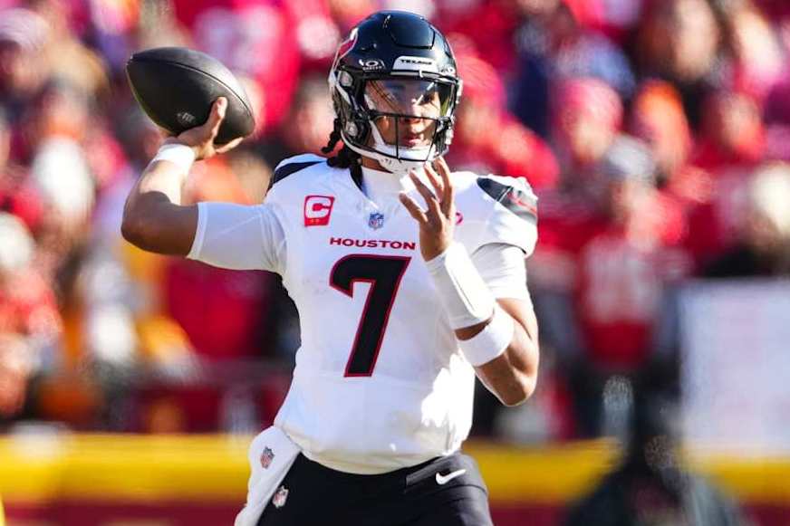 KANSAS CITY, MO - DECEMBER 21: C.J. Stroud #7 of the Houston Texans throws the ball during an NFL football game against the Kansas City Chiefs at GEHA Field at Arrowhead Stadium on December 21, 2024 in Kansas City, Missouri. (Photo by Cooper Neill/Getty Images)
