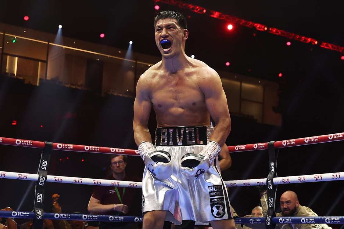 RIYADH, SAUDI ARABIA - JUNE 01: Dmitrii Bivol celebrates after Referee Howard Foster stops the fight during the IBO World and WBA Super World Light Heavyweight Titles fight between Dmitrii Bivol and Malik Zinad on the 5v5: Queensberry v Matchroom Fight Night card at Kingdom Arena on June 01, 2024 in Riyadh, Saudi Arabia. (Photo by Richard Pelham/Getty Images)