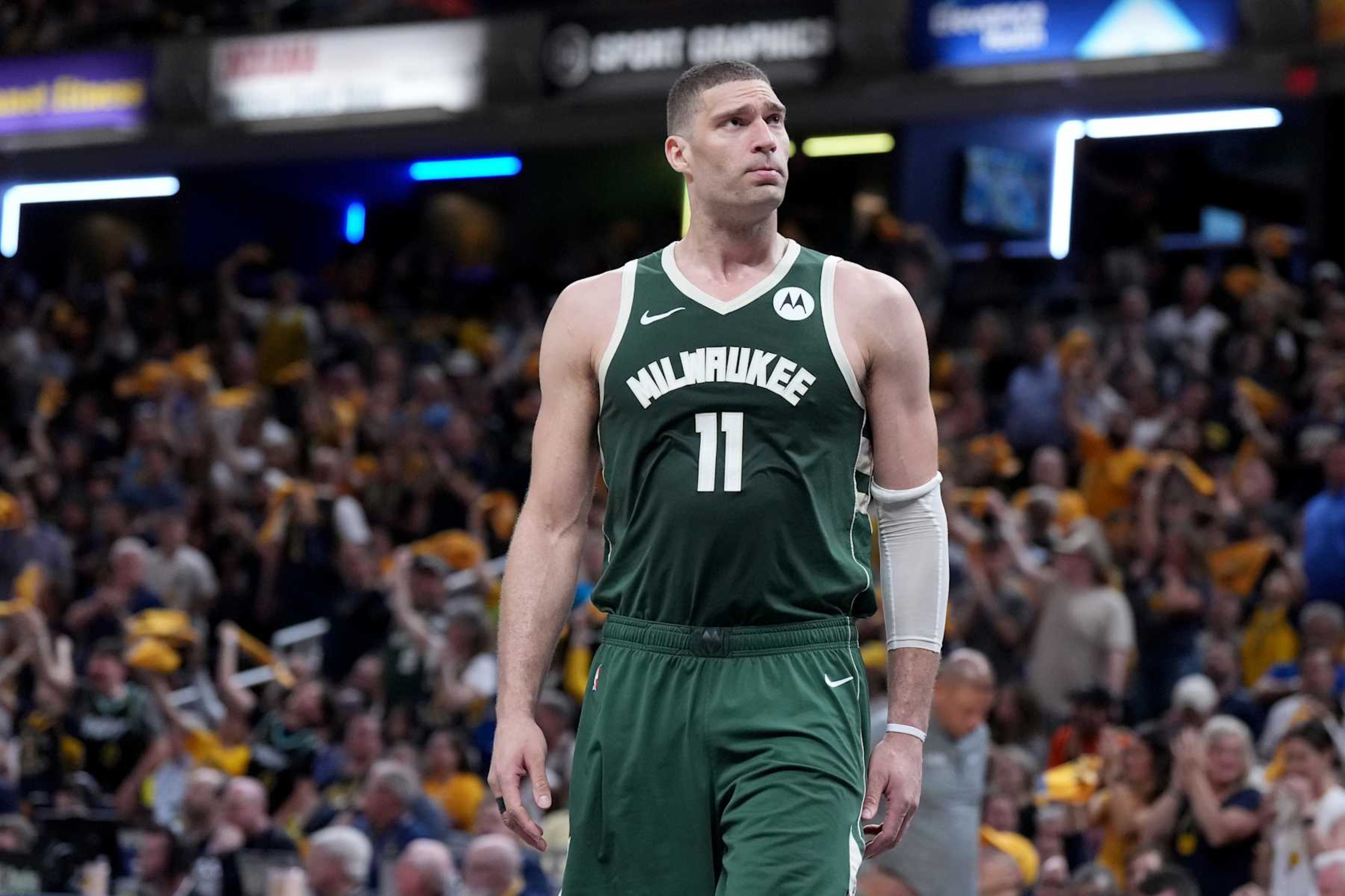INDIANAPOLIS, INDIANA - APRIL 28: Brook Lopez #11 of the Milwaukee Bucks looks on during Game Four of the Eastern Conference First Round Playoffs against the Indiana Pacers at Gainbridge Fieldhouse on April 28, 2024 in Indianapolis, Indiana. NOTE TO USER: User expressly acknowledges and agrees that, by downloading and or using this photograph, User is consenting to the terms and conditions of the Getty Images License Agreement. (Photo by Emilee Chinn/Getty Images)