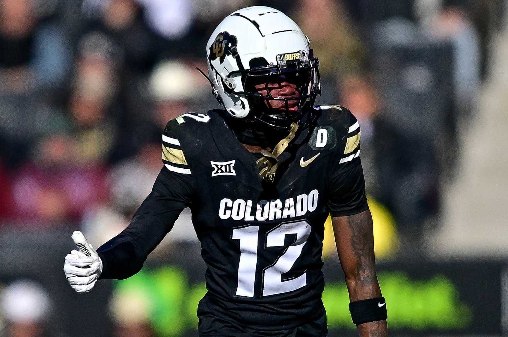 BOULDER, CO - NOVEMBER 29:  Travis Hunter #12 of the Colorado Buffaloes lines up on offense in the second quarter against the Oklahoma State Cowboys at Folsom Field on November 29, 2024 in Boulder, Colorado. (Photo by Dustin Bradford/Getty Images)