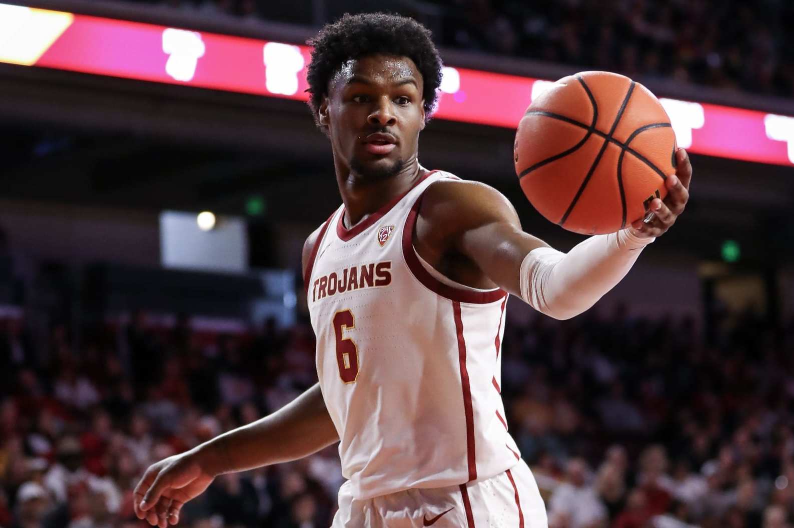LOS ANGELES, CALIFORNIA - JANUARY 06: Bronny James #6 of the USC Trojans looks to pass the ball in the second half against the Stanford Cardinal at Galen Center on January 06, 2024 in Los Angeles, California. (Photo by Meg Oliphant/Getty Images)