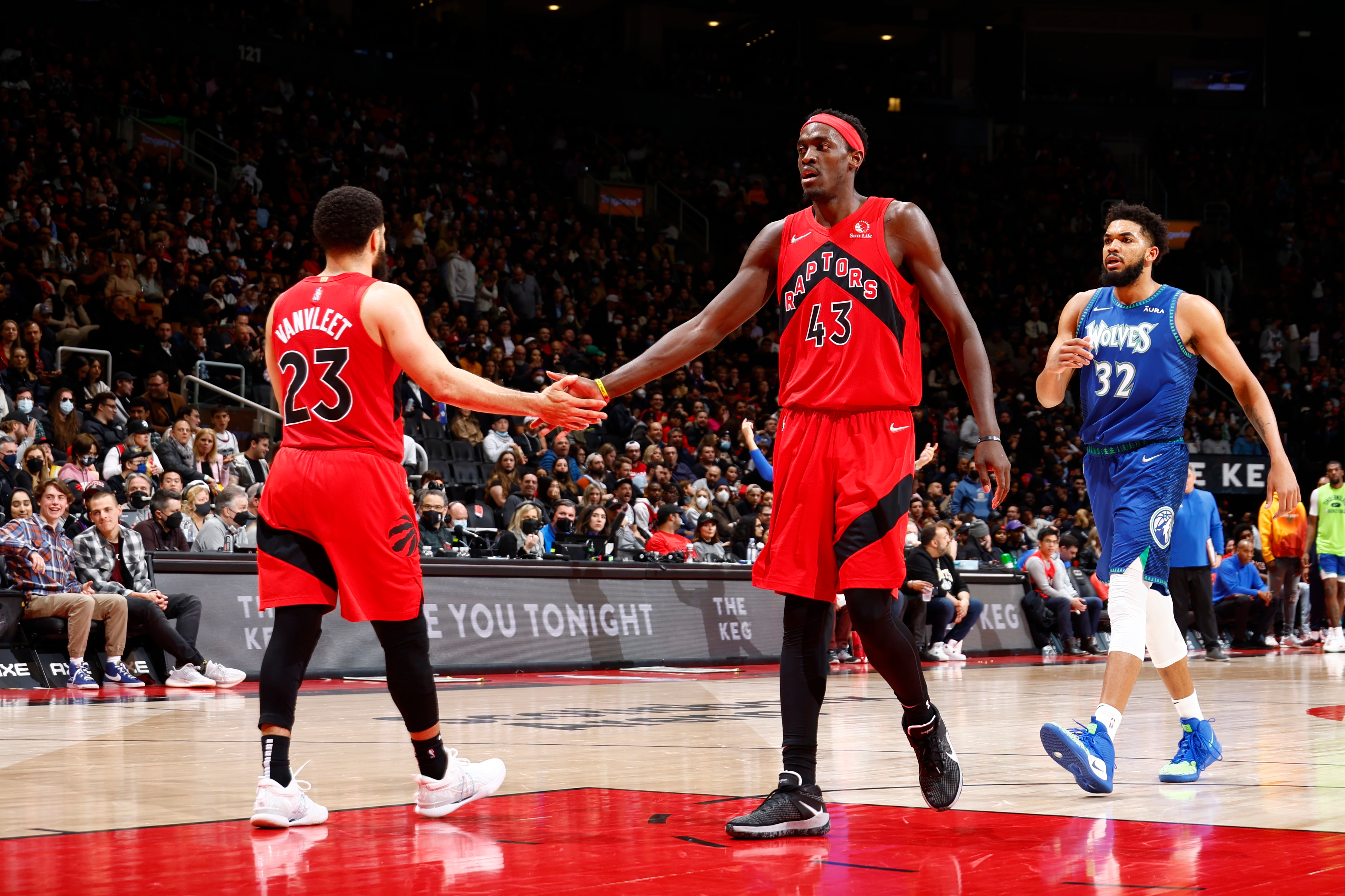 TORONTO, CANADA - MARCH 30: Fred VanVleet #23 hi-fives Pascal Siakam #43 of the Toronto Raptors during the game against the Minnesota Timberwolves on March 30, 2022 at the Scotiabank Arena in Toronto, Ontario, Canada.  NOTE TO USER: User expressly acknowledges and agrees that, by downloading and or using this Photograph, user is consenting to the terms and conditions of the Getty Images License Agreement.  Mandatory Copyright Notice: Copyright 2022 NBAE (Photo by Vaughn Ridley/NBAE via Getty Images)