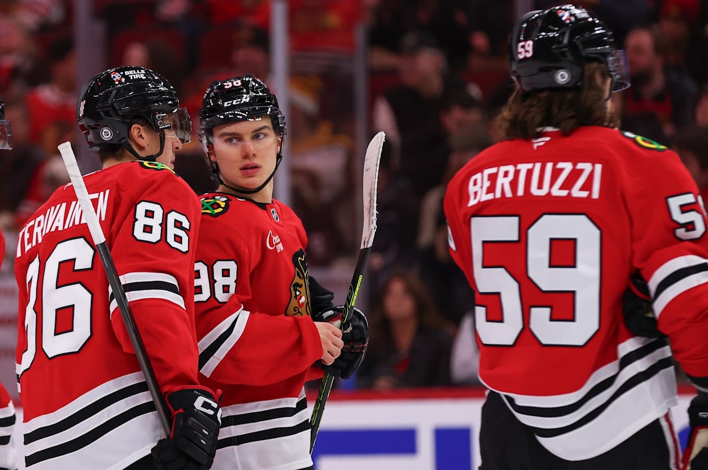 CHICAGO, IL - DECEMBER 04: Connor Bedard #98 of the Chicago Blackhawks chats with Teuvo Teravainen #86 of the Chicago Blackhawks during the first period against the Boston Bruins on December 4, 2024 at the United Center in Chicago, Illinois. (Photo by Melissa Tamez/Icon Sportswire via Getty Images)