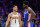 PHILADELPHIA, PA - NOVEMBER 7: Devin Booker #1 of the Phoenix Suns talks to Joel Embiid #21 of the Philadelphia 76ers during the game on November 7, 2022 at the Wells Fargo Center in Philadelphia, Pennsylvania NOTE TO USER: User expressly acknowledges and agrees that, by downloading and/or using this Photograph, user is consenting to the terms and conditions of the Getty Images License Agreement. Mandatory Copyright Notice: Copyright 2022 NBAE (Photo by Jesse D. Garrabrant/NBAE via Getty Images)