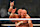 Shawn Michaels (R) and Triple H, of D-Generation X, celebrate their win during a tag team match as part of as part of the World Wrestling Entertainment (WWE) Crown Jewel pay-per-view at the King Saud University Stadium in Riyadh on November 2, 2018. (Photo by Fayez Nureldine / AFP) (Photo credit should read FAYEZ NURELDINE/AFP via Getty Images)