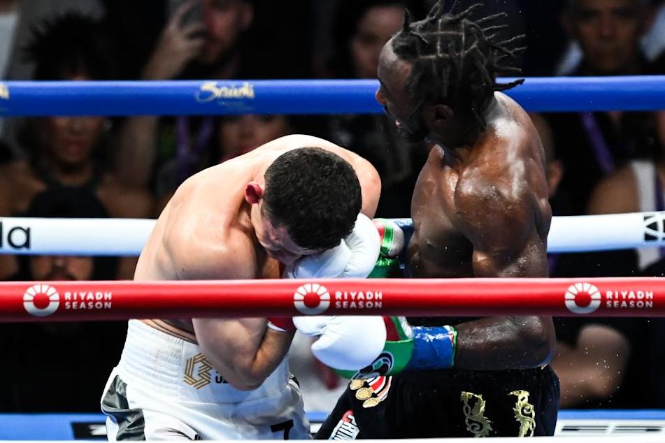 LOS ANGELES, CALIFORNIA - AUGUST 03: Terence Crawford 'Bud' (black) from Omaha, Nebraska and Israil Madrimov 'The Dream' (white) from Uzbekistan exchange punches during their WBA World WBO Interim title of the Premiere Boxing Championship during Riyadh Season on Saturday night at the BMO Stadium in Los Angeles, California United States on August 03, 2024. (Photo by Tayfun Coskun/Anadolu via Getty Images)