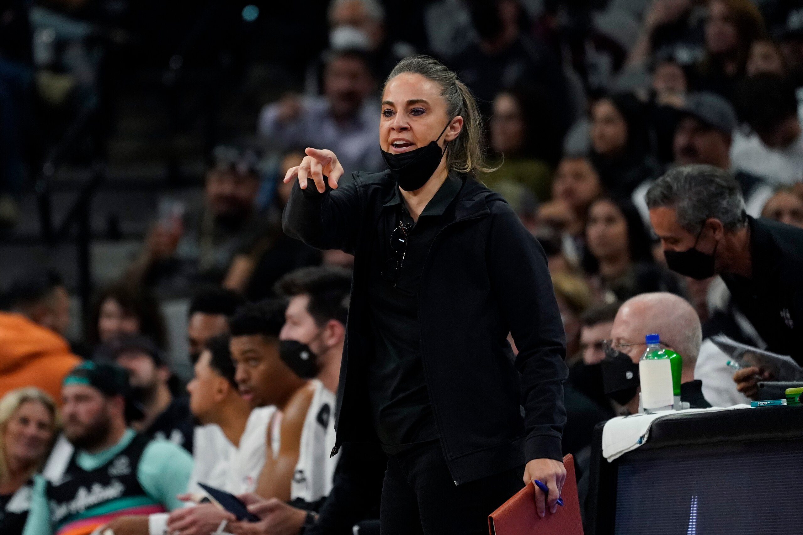 San Antonio Spurs assistant coach Becky Hammon during the first half of an NBA basketball game against the Dallas Mavericks, Friday, Nov. 12, 2021, in San Antonio. (AP Photo/Eric Gay)