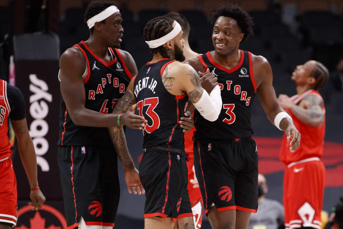 TORONTO, ON - FEBRUARY 03: OG Anunoby #3 and Pascal Siakam #43 celebrate a three pointer from Gary Trent Jr. #33 of the Toronto Raptors late in overtime of their NBA game at Scotiabank Arena on February 3, 2022 in Toronto, Canada. NOTE TO USER: User expressly acknowledges and agrees that, by downloading and or using this Photograph, user is consenting to the terms and conditions of the Getty Images License Agreement. (Photo by Cole Burston/Getty Images) TORONTO, ON - FEBRUARY 03: OG Anunoby #3 and Pascal Siakam #43 celebrate a three pointer from Gary Trent Jr. #33 of the Toronto Raptors late in overtime of their NBA game at Scotiabank Arena on February 3, 2022 in Toronto, Canada. NOTE TO USER: User expressly acknowledges and agrees that, by downloading and or using this Photograph, user is consenting to the terms and conditions of the Getty Images License Agreement. (Photo by Cole Burston/Getty Images)