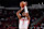 HOUSTON, TX - OCTOBER 15: Cam Whitmore #7 of the Houston Rockets shoots a three point basket during the game against the New Orleans Pelicans during a NBA preseason game on October 15, 2024 at the Toyota Center in Houston, Texas. NOTE TO USER: User expressly acknowledges and agrees that, by downloading and or using this photograph, User is consenting to the terms and conditions of the Getty Images License Agreement. Mandatory Copyright Notice: Copyright 2024 NBAE (Photo by Logan Riely/NBAE via Getty Images)