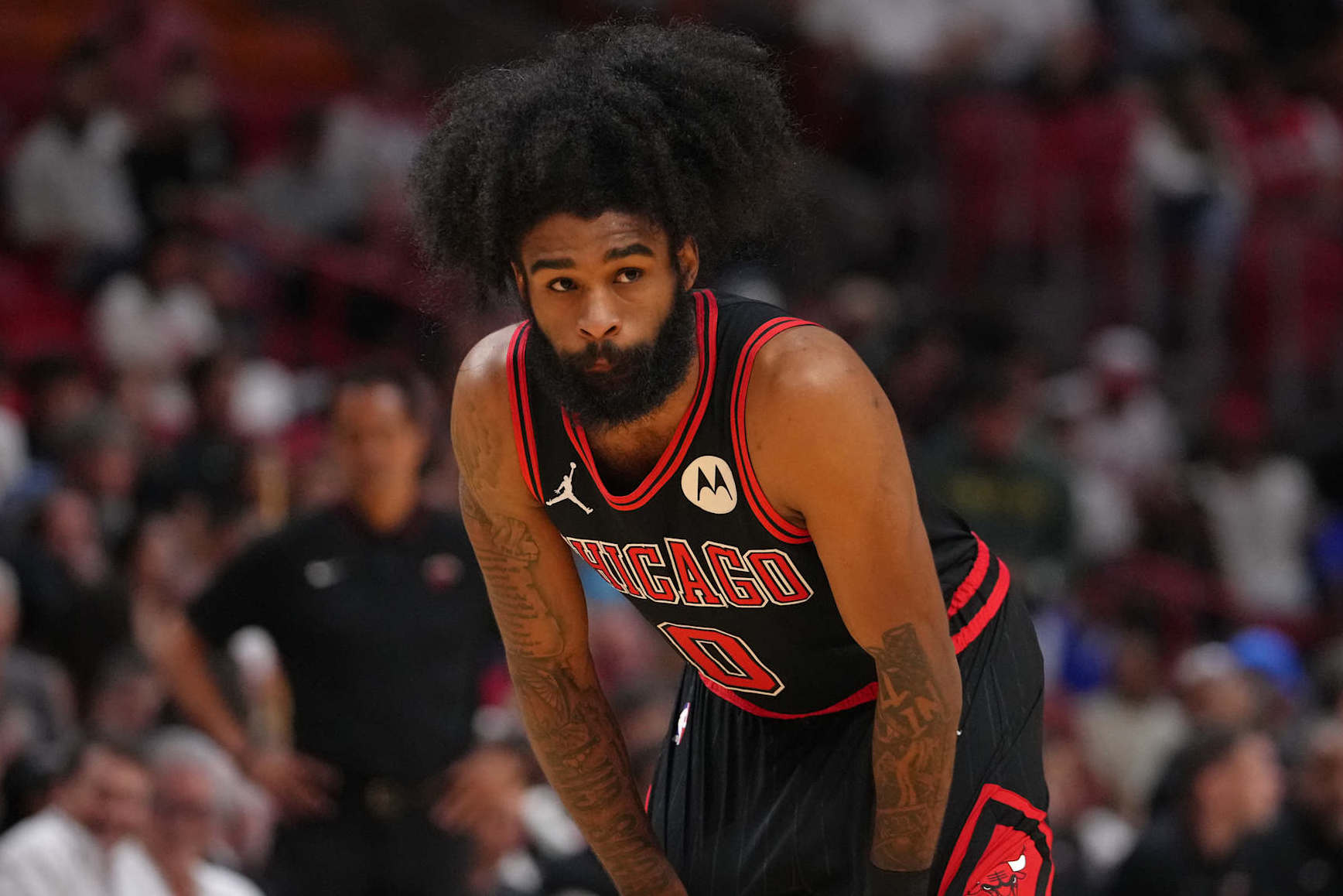 MIAMI, FL - APRIL 19: Coby White #0 of the Chicago Bulls looks on during the game against the Miami Heat during the 2024 SoFi Play-In Tournament on April 19, 2024 at Kaseya Center in Miami, Florida. NOTE TO USER: User expressly acknowledges and agrees that, by downloading and or using this Photograph, user is consenting to the terms and conditions of the Getty Images License Agreement. Mandatory Copyright Notice: Copyright 2024 NBAE (Photo by Eric Espada/NBAE via Getty Images)