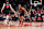 TORONTO, ON - FEBRUARY 10: Scottie Barnes #4 of the Toronto Raptors celebrates with Jakob Poeltl #19 and Immanuel Quickley #5 against the Cleveland Cavaliers during the second half of their basketball game at the Scotiabank Arena on February 10, 2024 in Toronto, Ontario, Canada. NOTE TO USER: User expressly acknowledges and agrees that, by downloading and/or using this Photograph, user is consenting to the terms and conditions of the Getty Images License Agreement. (Photo by Mark Blinch/Getty Images)