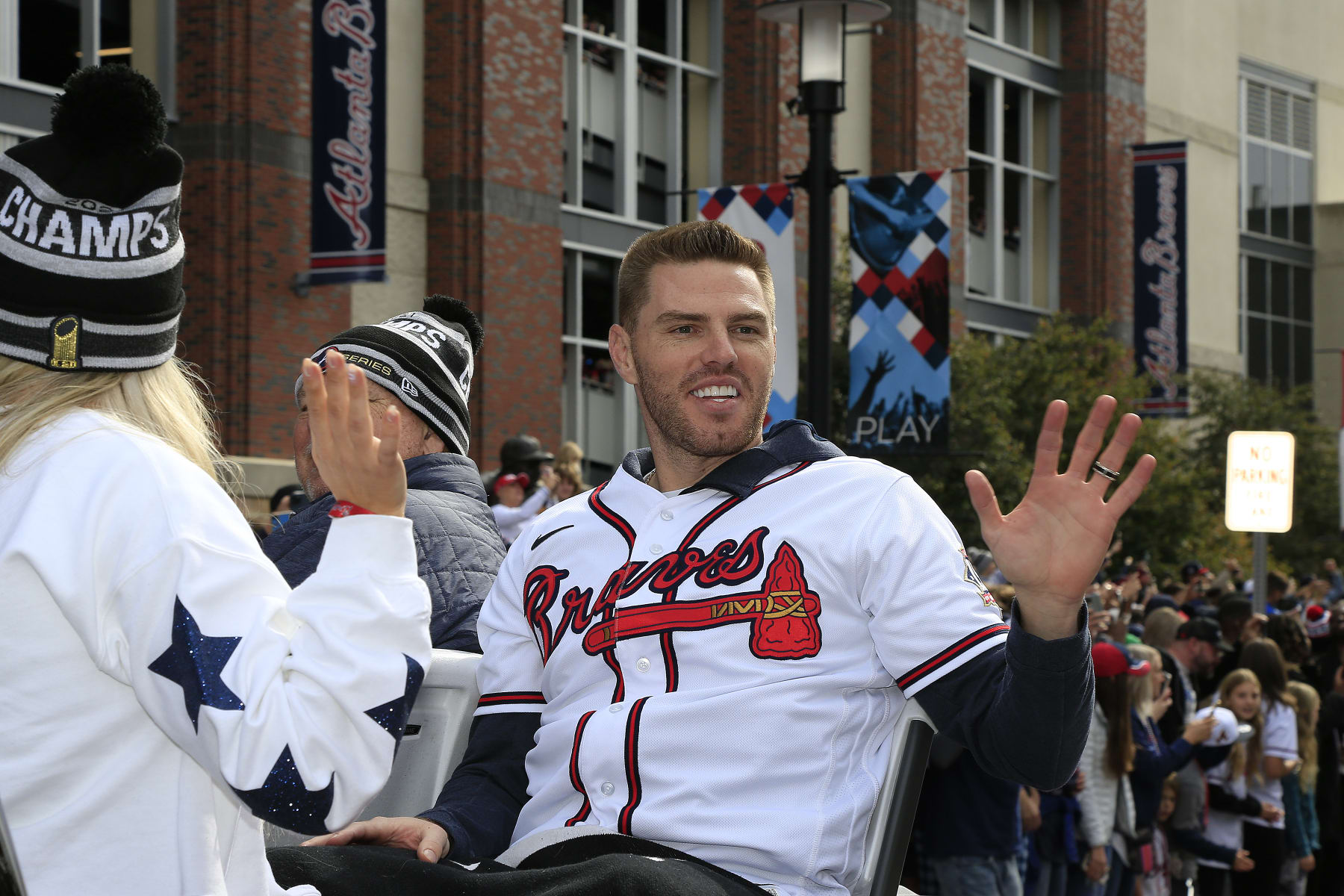ATLANTA, GA - NOVEMBER 05: Atlanta Braves first baseman Freddie Freeman waves to the fans during the World Series Championship Parade and Celebration at The Battery and Truist Park on November 5, 2021 in Atlanta, Georgia.   (Photo by David J. Griffin/Icon Sportswire via Getty Images)