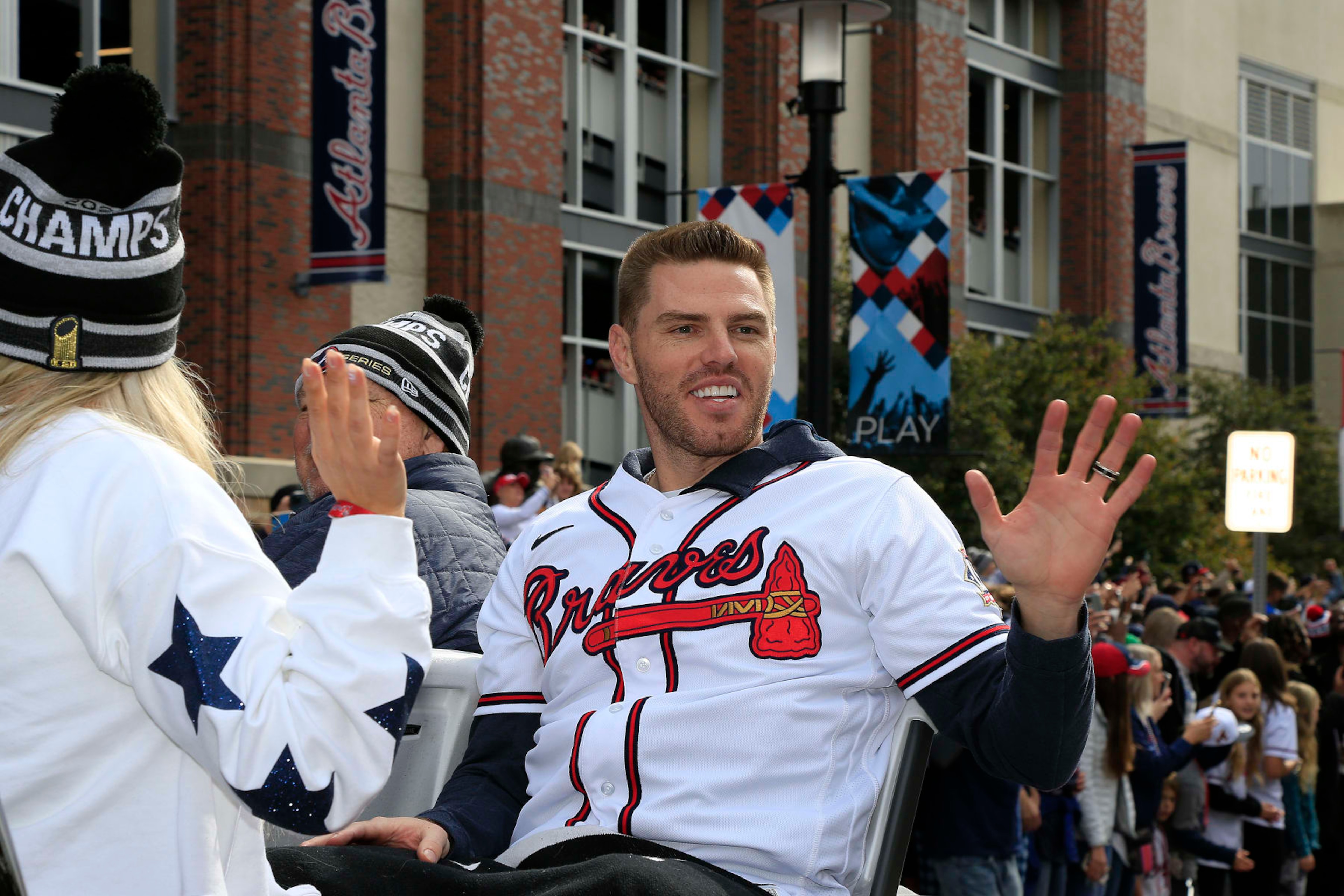 ATLANTA, GA - NOVEMBER 05: Atlanta Braves first baseman Freddie Freeman waves to the fans during the World Series Championship Parade and Celebration at The Battery and Truist Park on November 5, 2021 in Atlanta, Georgia.   (Photo by David J. Griffin/Icon Sportswire via Getty Images)