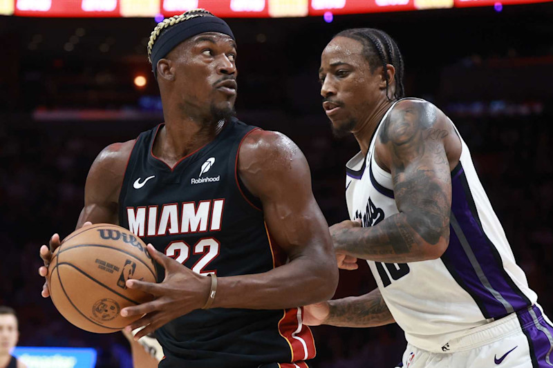 MIAMI, FLORIDA - NOVEMBER 04: Jimmy Butler #22 of the Miami Heat controls the ball against DeMar DeRozan #10 of the Sacramento Kings during the second half at Kaseya Center on November 04, 2024 in Miami, Florida. NOTE TO USER: User expressly acknowledges and agrees that, by downloading and or using this Photograph, user is consenting to the terms and conditions of the Getty Images License Agreement. (Photo by Carmen Mandato/Getty Images)
