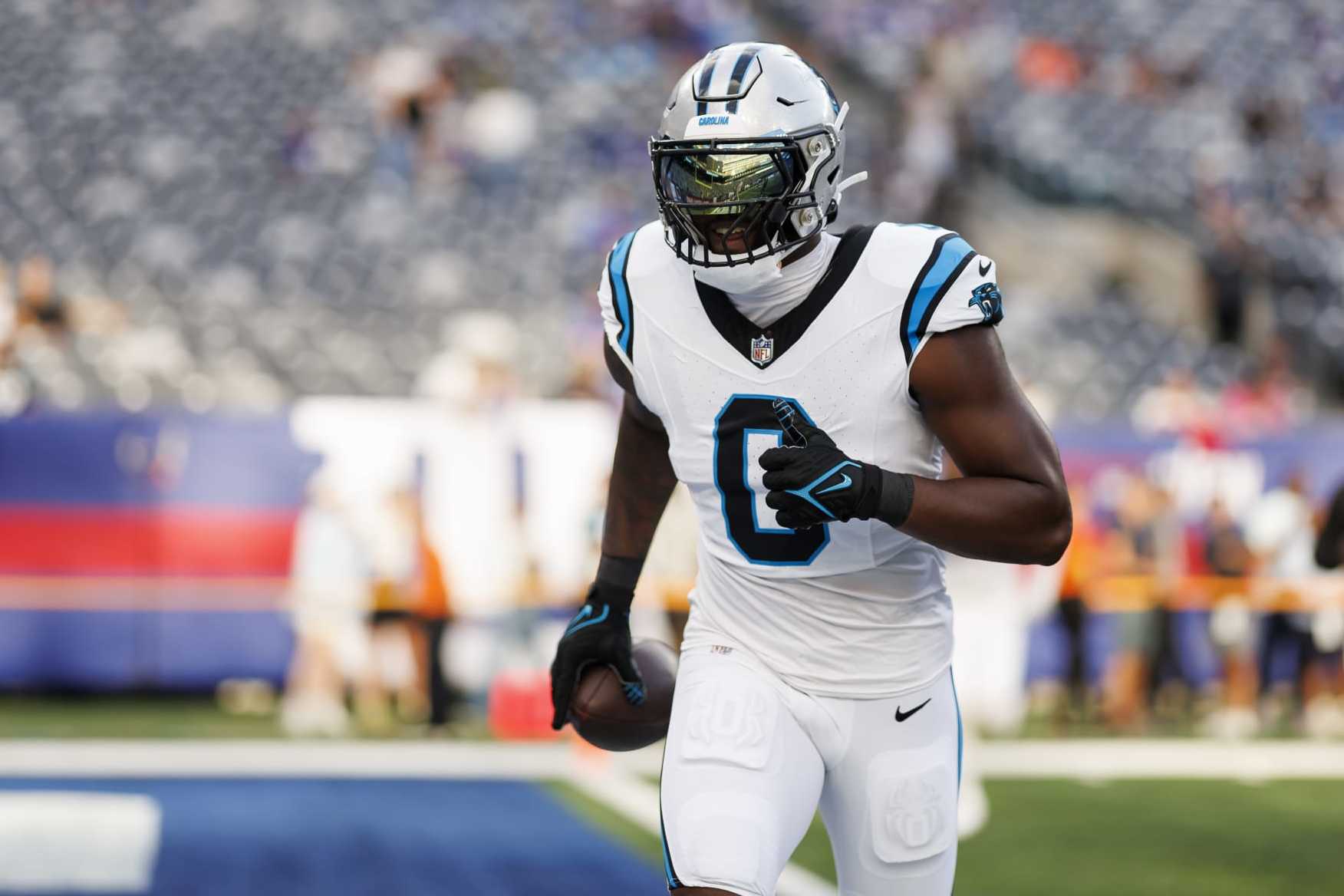 EAST RUTHERFORD, NEW JERSEY - AUGUST 18: Brian Burns #0 of the Carolina Panthers runs during pregame warmups prior to an NFL preseason football game against the New York Giants at MetLife Stadium on August 18, 2023 in East Rutherford, New Jersey. (Photo by Ryan Kang/Getty Images)