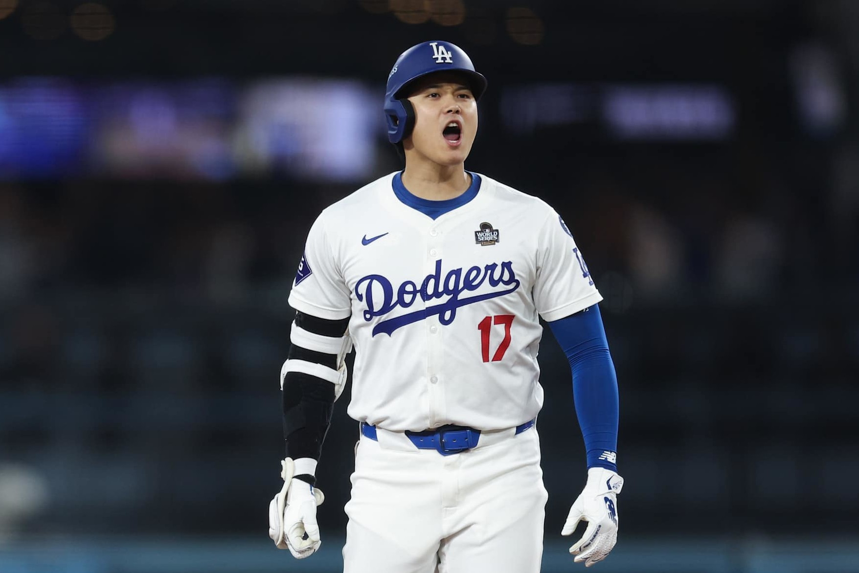 LOS ANGELES, CALIFORNIA - OCTOBER 25: Shohei Ohtani #17 of the Los Angeles Dodgers reacts after hitting a double in the eighth inning against the New York Yankees during Game One of the 2024 World Series at Dodger Stadium on October 25, 2024 in Los Angeles, California. (Photo by Harry How/Getty Images)