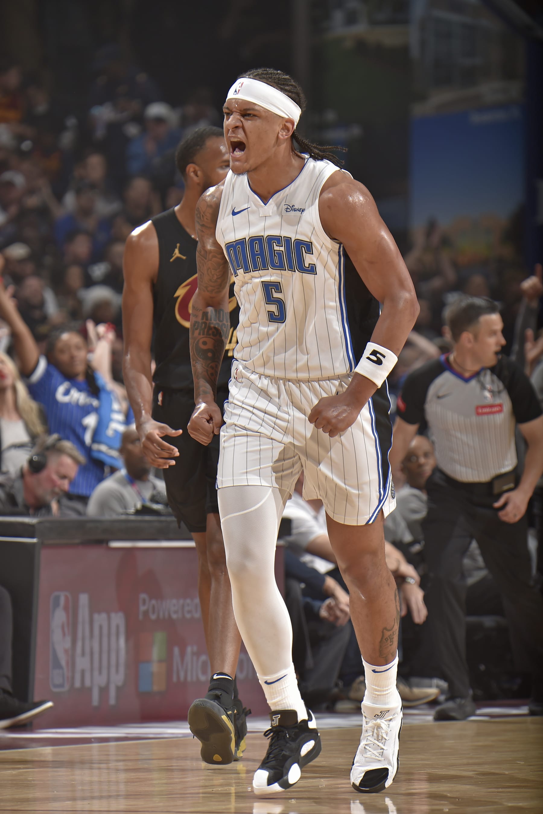 CLEVELAND, OH - MAY 5: Paolo Banchero #5 of the Orlando Magic celebrates during the game against the Cleveland Cavaliers during Round 1 Game 7 of the 2024 NBA Playoffs on May 5, 2024 at Rocket Mortgage FieldHouse in Cleveland, Ohio. NOTE TO USER: User expressly acknowledges and agrees that, by downloading and/or using this Photograph, user is consenting to the terms and conditions of the Getty Images License Agreement. Mandatory Copyright Notice: Copyright 2024 NBAE (Photo by David Liam Kyle/NBAE via Getty Images)