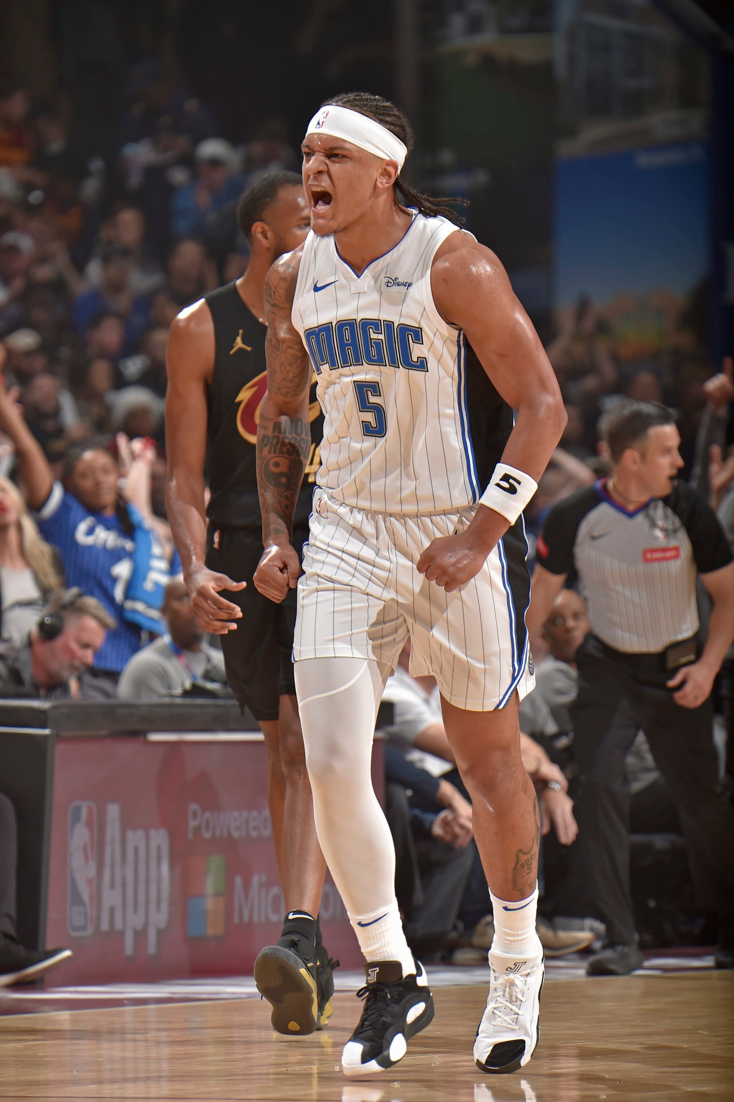 CLEVELAND, OH - MAY 5: Paolo Banchero #5 of the Orlando Magic celebrates during the game against the Cleveland Cavaliers during Round 1 Game 7 of the 2024 NBA Playoffs on May 5, 2024 at Rocket Mortgage FieldHouse in Cleveland, Ohio. NOTE TO USER: User expressly acknowledges and agrees that, by downloading and/or using this Photograph, user is consenting to the terms and conditions of the Getty Images License Agreement. Mandatory Copyright Notice: Copyright 2024 NBAE (Photo by David Liam Kyle/NBAE via Getty Images) CLEVELAND, OH - MAY 5: Paolo Banchero #5 of the Orlando Magic celebrates during the game against the Cleveland Cavaliers during Round 1 Game 7 of the 2024 NBA Playoffs on May 5, 2024 at Rocket Mortgage FieldHouse in Cleveland, Ohio. NOTE TO USER: User expressly acknowledges and agrees that, by downloading and/or using this Photograph, user is consenting to the terms and conditions of the Getty Images License Agreement. Mandatory Copyright Notice: Copyright 2024 NBAE (Photo by David Liam Kyle/NBAE via Getty Images)