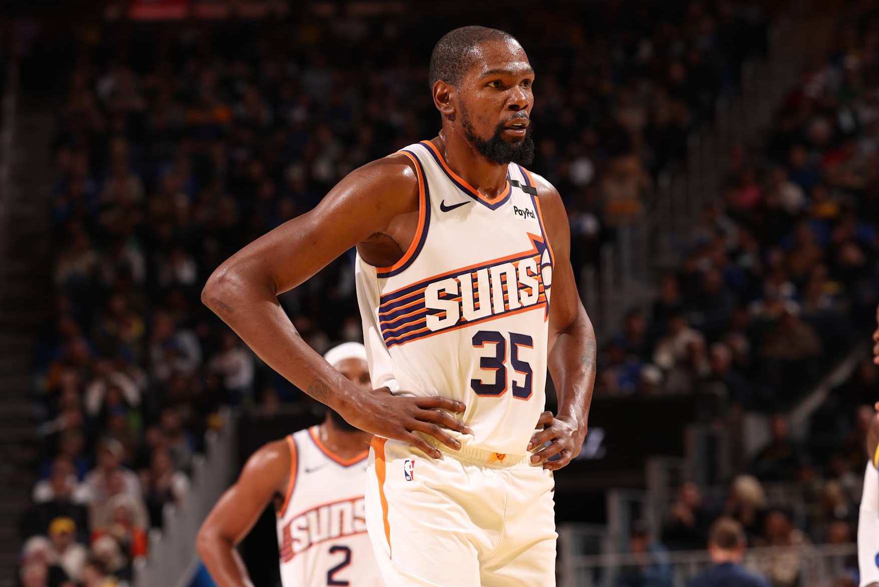 SAN FRANCISCO, CA - DECEMBER 28:   Kevin Durant #35 of the Phoenix Suns looks on during the game against the Golden State Warriors on December 28, 2024 at Chase Center in San Francisco, California. NOTE TO USER: User expressly acknowledges and agrees that, by downloading and or using this photograph, user is consenting to the terms and conditions of Getty Images License Agreement. Mandatory Copyright Notice: Copyright 2024 NBAE (Photo by Jed Jacobsohn/NBAE via Getty Images)