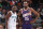 MINNEAPOLIS, MN -  APRIL 14: Anthony Edwards #5 of the Minnesota Timberwolves and Kevin Durant #35 of the Phoenix Suns look on during the game on April 14, 2024 at Target Center in Minneapolis, Minnesota. NOTE TO USER: User expressly acknowledges and agrees that, by downloading and or using this Photograph, user is consenting to the terms and conditions of the Getty Images License Agreement. Mandatory Copyright Notice: Copyright 2024 NBAE (Photo by David Sherman/NBAE via Getty Images)
