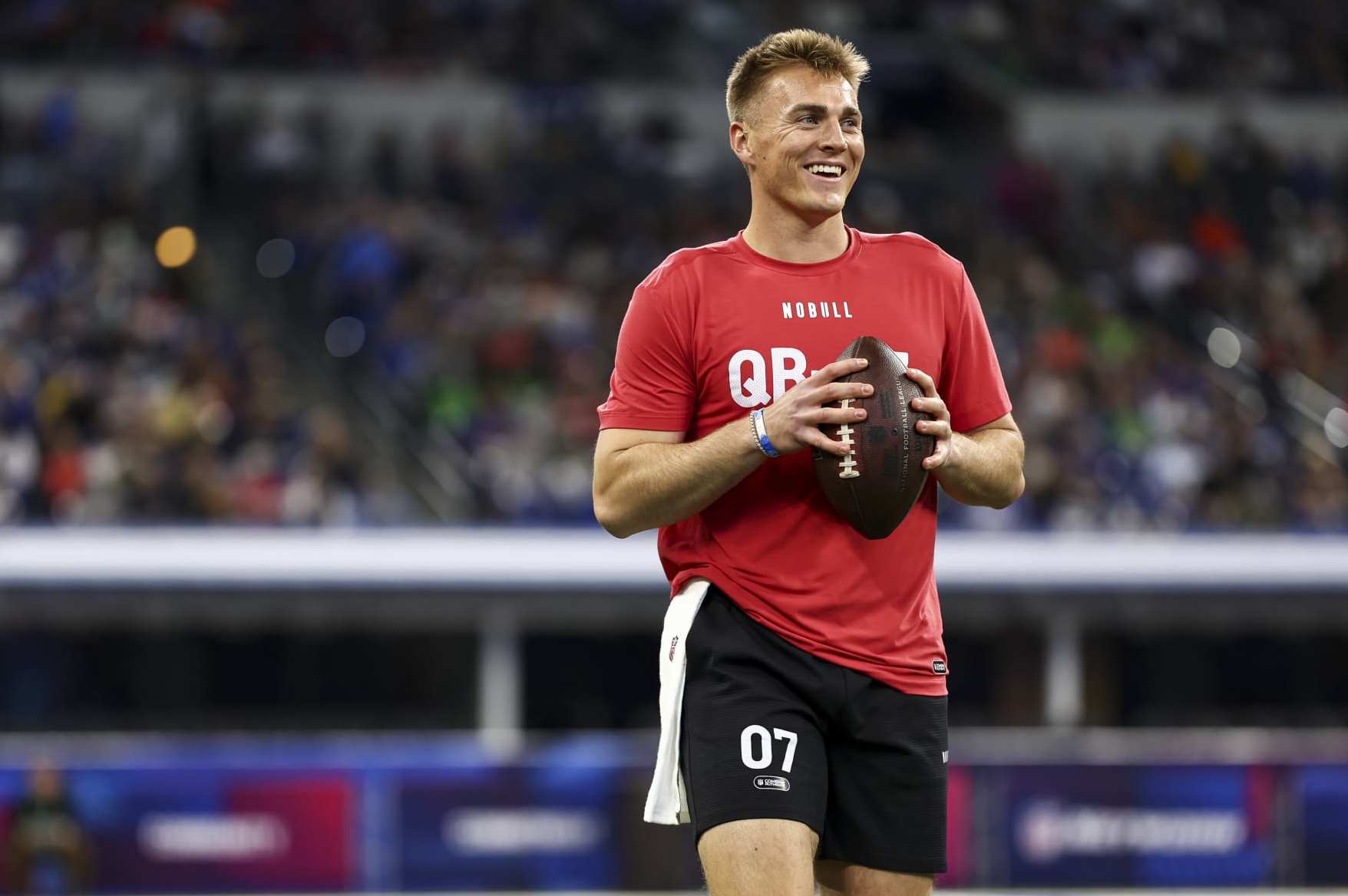 INDIANAPOLIS, INDIANA - MARCH 2: Bo Nix #QB07 of Oregon participates in a drill during the NFL Combine at the Lucas Oil Stadium on March 2, 2024 in Indianapolis, Indiana. (Photo by Kevin Sabitus/Getty Images)
