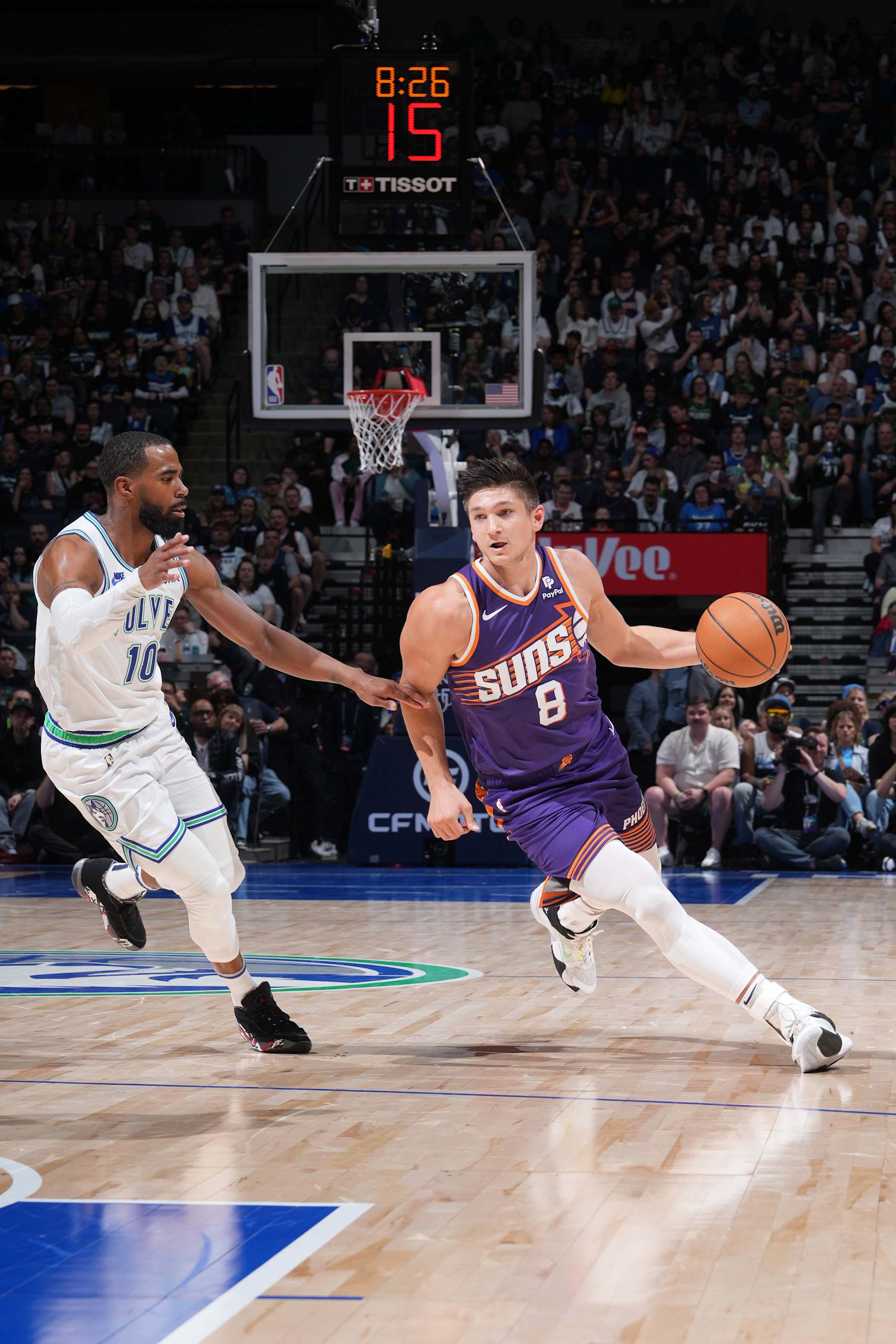 MINNEAPOLIS, MN -  APRIL 14: Grayson Allen #8 of the Phoenix Suns handles the ball during the game against the Minnesota Timberwolves on April 14, 2024 at Target Center in Minneapolis, Minnesota. NOTE TO USER: User expressly acknowledges and agrees that, by downloading and or using this Photograph, user is consenting to the terms and conditions of the Getty Images License Agreement. Mandatory Copyright Notice: Copyright 2024 NBAE (Photo by Jordan Johnson/NBAE via Getty Images)