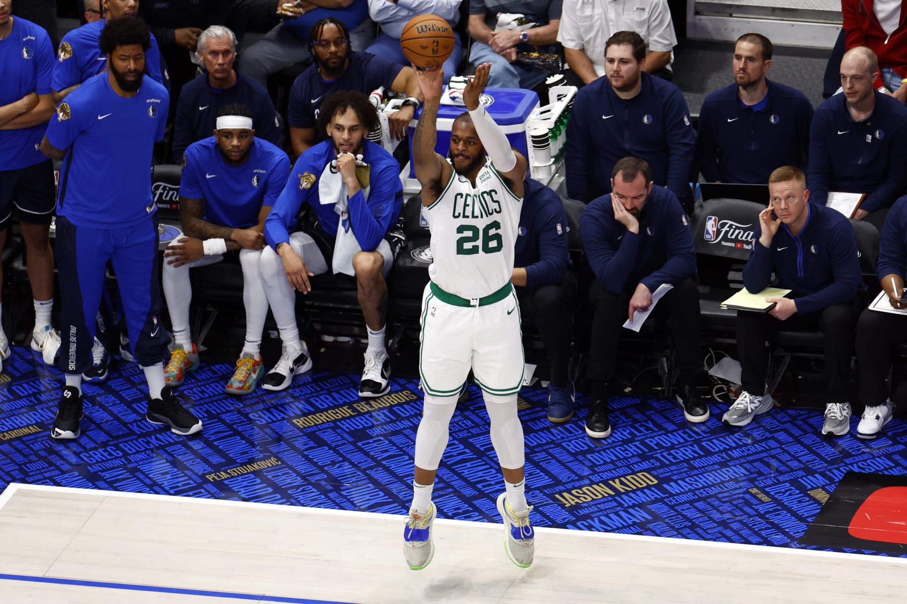 Dallas, TX - 6/12/24 - Boston Celtics forward Xavier Tillman (26) makes a 3-point basket during the third quarter in Game 3 of the NBA Finals. The Dallas Mavericks hosted the Boston Celtics at American Airlines Center on Wednesday, June 12, 2024.(Photo by Danielle Parhizkaran/The Boston Globe via Getty)